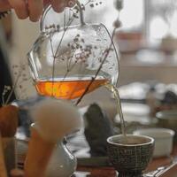 Indulge in an Elegant Tea Pouring Experience Set in a Truly Serene and Peaceful Setting photo