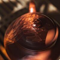 An Elegant Teapot Featuring Captivating Light Reflections That Enhance Its Beauty photo