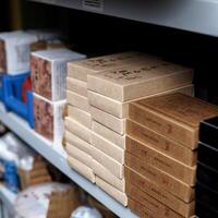 WellOrganized Stock of Various Multicolored Packaging Displayed on the Shelf Neatly photo