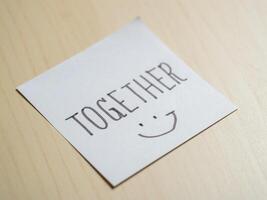 Close-up view of togetherness inspirational notes for your home workspace photo