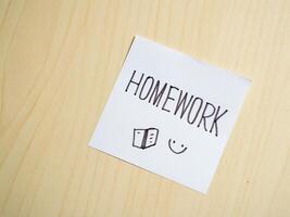 Homework reminder note study space productivity tool minimalist setup close-up organization tips photo