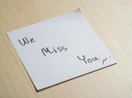 Close-up of sentimental farewell note at home table an emotional connection photo