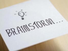 Brainstorming ideas for creative projects office environment visual concept close-up view photo