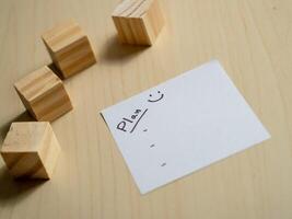 Boost productivity in a minimalist home office with wooden blocks for task organization photo
