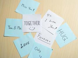 Affectionate messages creating a cozy home workspace together photo
