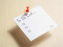 Organizing daily tasks to-do list creation at home office productivity minimalist focused viewpoint photo