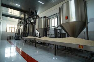 Modern food processing plant showing malt grain and industrial steel equipment photo