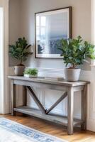 Modern farmhouse entryway decor featuring rustic console table and fiddle leaf fig trees photo
