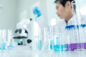 Scientist analyze biochemical sample in advanced scientific laboratory. Medical professional check chemical mix microbiological developmental of viral. Biotechnology research in science lab. cosmetic photo