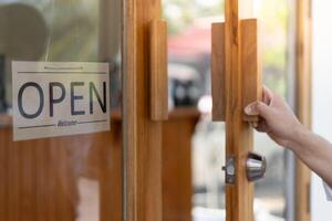 show sign open on the first day of business. guarantees safety, cleanliness, open the coffee shop. open for New normal. Small business, welcome, restaurant, home made photo