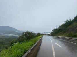 The road on a rainy day is wet photo