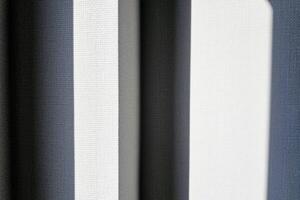 White Pole and Wallpaper Background with Light Beam and Shadow. photo