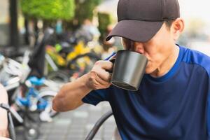 Man relaxing drinking coffee in the morning. photo