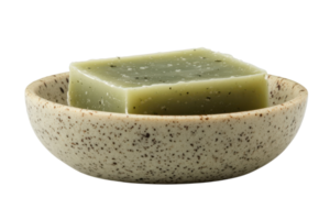 Handmade green soap bar displayed elegantly in a rustic bowl, perfect for natural skincare enthusiasts seeking eco-friendly options png