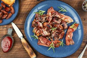 Elegant appetizer featuring bacon-wrapped dates. photo
