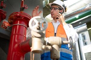 Engineers inspect the completed water systems to continue verifying their functionality. photo