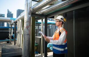 Engineers inspect the completed air conditioning and water systems to continue verifying their functionality. photo