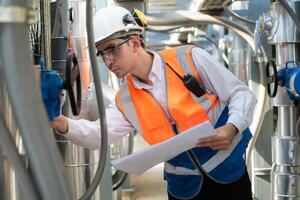 Engineers inspect the completed air conditioning and water systems to continue verifying their functionality. photo