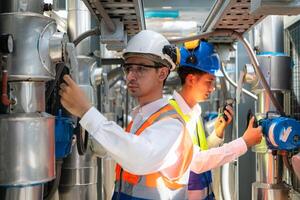 Engineers and technicians Inspect the completed air conditioning and water systems to continue verifying their functionality. photo