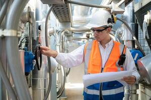 Engineers inspect the completed air conditioning and water systems to continue verifying their functionality. photo