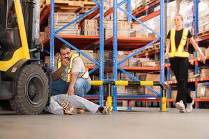 A warehouse employee suffered a leg accident at work photo