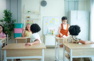 Students learn and study in a classroom of school where youngsters sit and listen attentively. photo