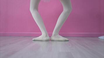 The rhythm of the legs and feet of ballet student practices ballet dancing photo