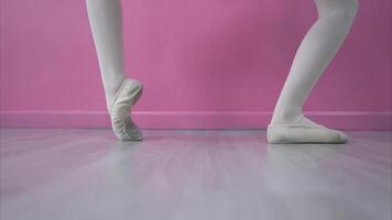 The rhythm of the legs and feet of ballet student practices ballet dancing photo
