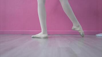 The rhythm of the legs and feet of ballet student practices ballet dancing photo