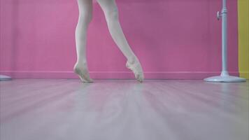 The rhythm of the legs and feet of ballet student practices ballet dancing photo