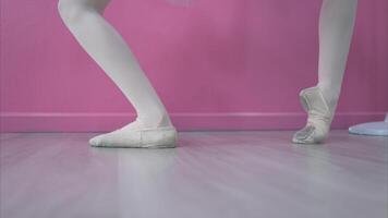 The rhythm of the legs and feet of ballet student practices ballet dancing photo