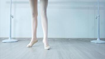 The rhythm of the legs and feet of ballet student practices ballet dancing photo