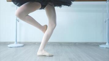 The rhythm of the legs and feet of ballet student practices ballet dancing photo