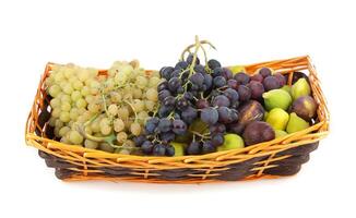 A basket of grapes on a white background photo