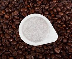 Coffee filter on coffee beans photo