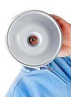 A man holding a silver dish over his head photo