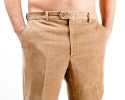A man wearing a tan pants and no shirt photo