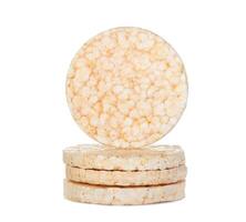 A stack of white rice cakes on a white background photo
