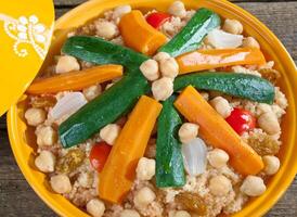 A plate of food with vegetables and rice photo