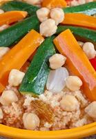 A plate of food with vegetables and rice photo