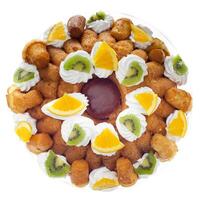 A plate of food with fruit and cream photo