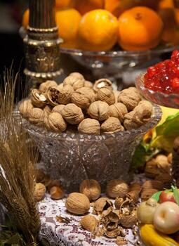 A table with a bunch of nuts and fruit photo