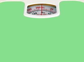 A bathroom scale with a green background photo