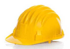 A yellow hard hat on a white background photo