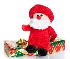 Colorful gift boxes with Santa Claus puppet photo