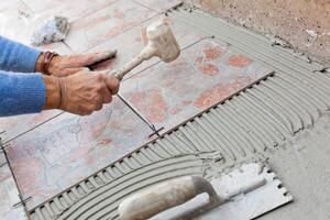 Tiler to work with tile flooring. photo