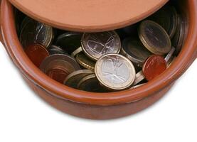 Ceramic pot full of Euro coins photo