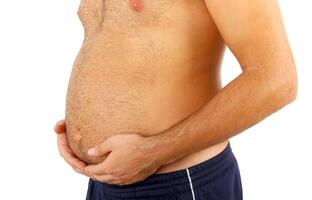 Big belly of a fat man photo