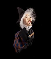 Befana, witch with flying broom photo