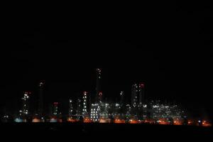 A large oil refinery at night photo